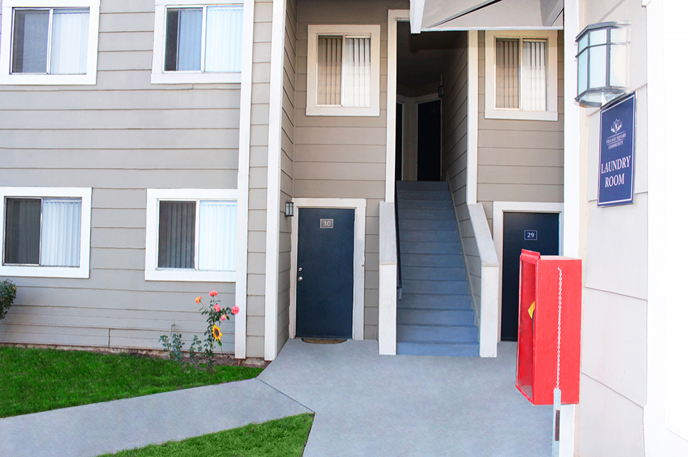 This Exteriors 5 photo can be viewed in person at the Village Square Apartments, so make a reservation and stop in today.